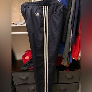 Gucci Adidas monogram men's pants.